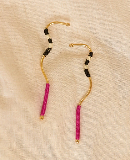 Aretes Malik Caída